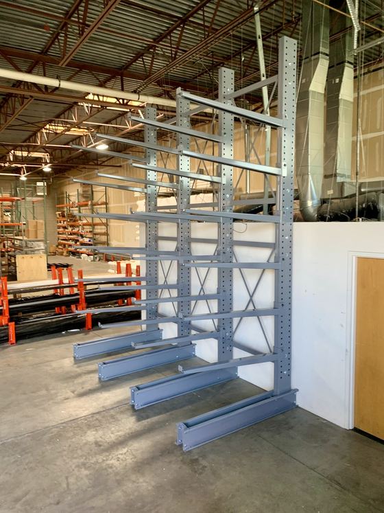Single-sided cantilever rack installed along a wall
