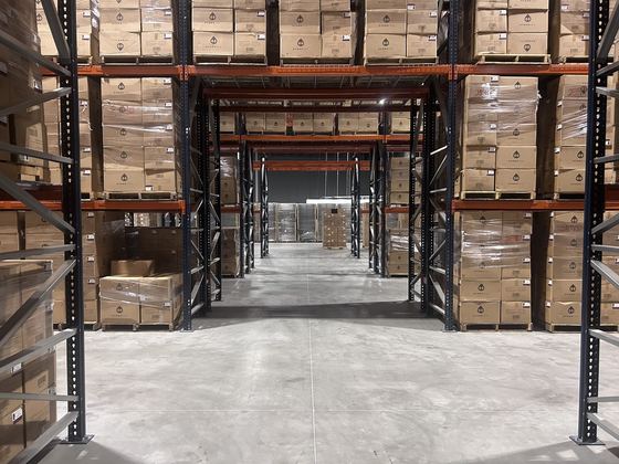 Loaded pallet racking aisle with palletized cartons